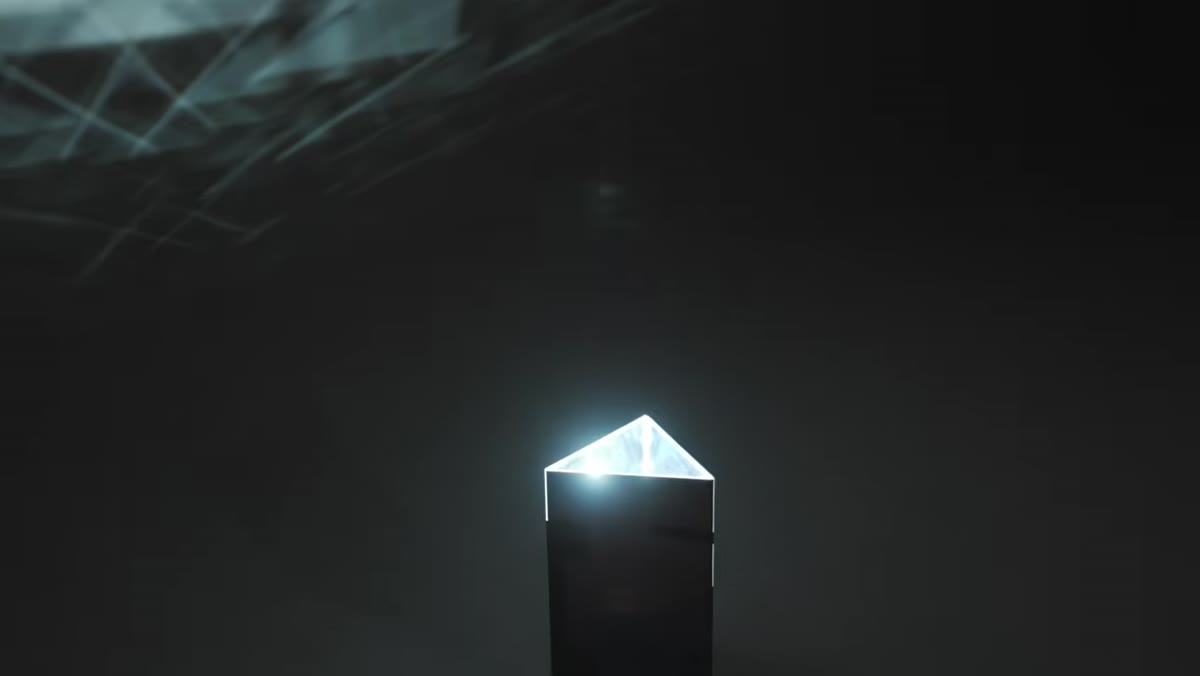 Mirror prism positioned facing upward toward backdrop