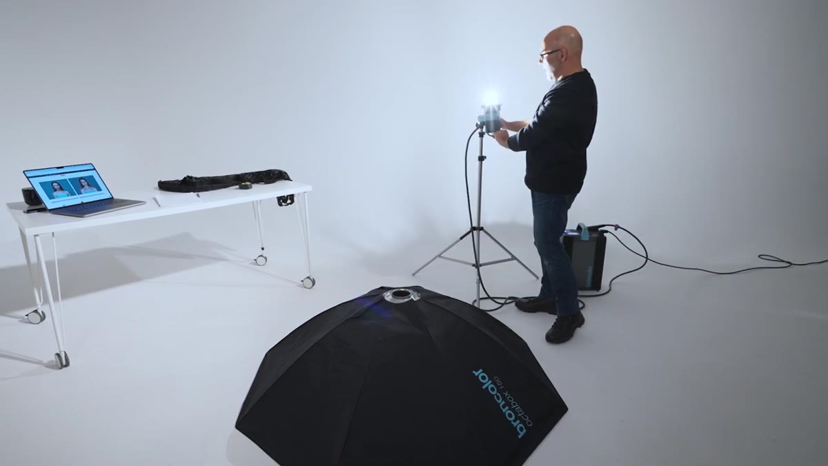 Strobe head angled upward for softbox reattachment