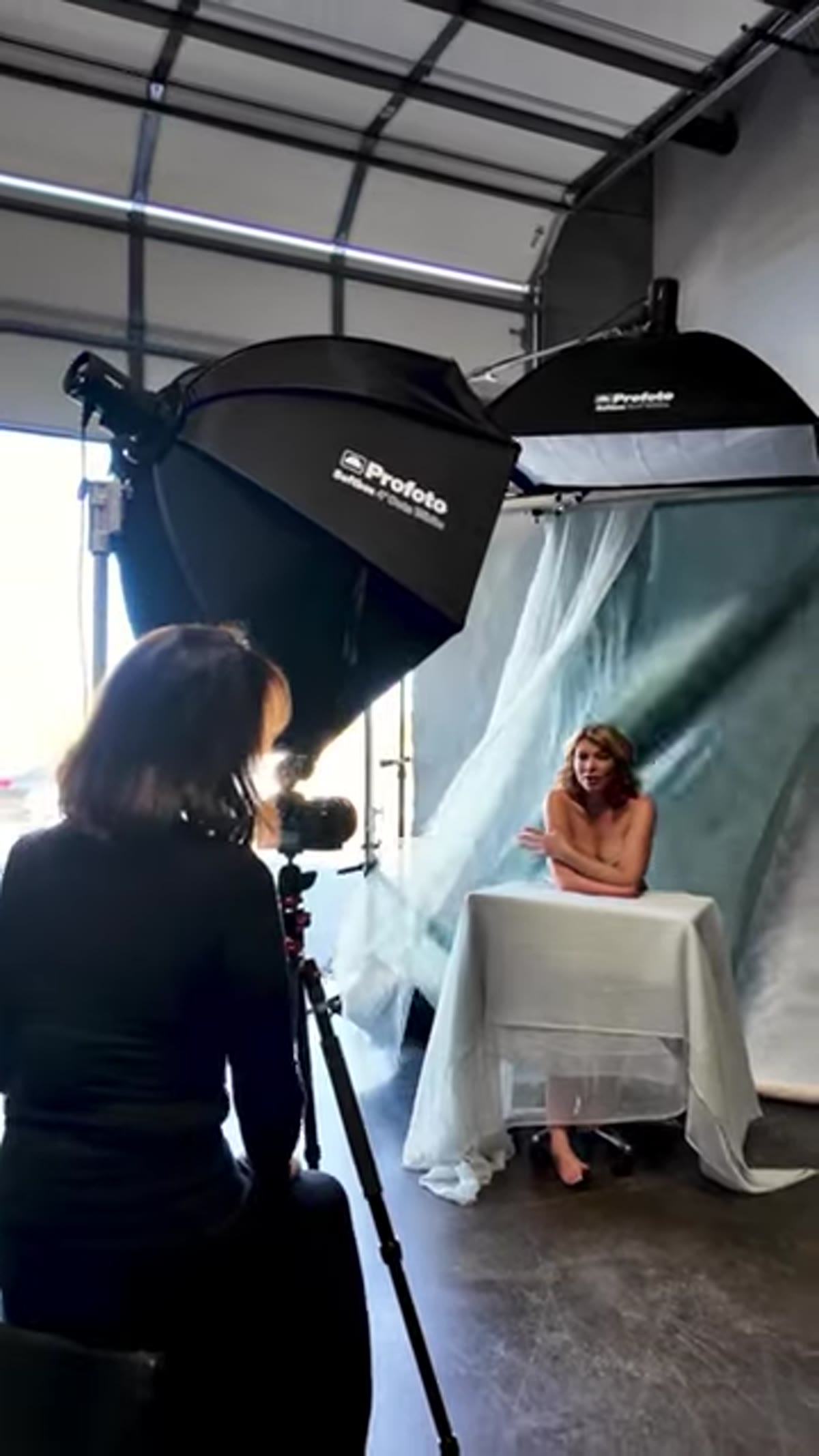 Sue adjusting power output on Profoto light head
