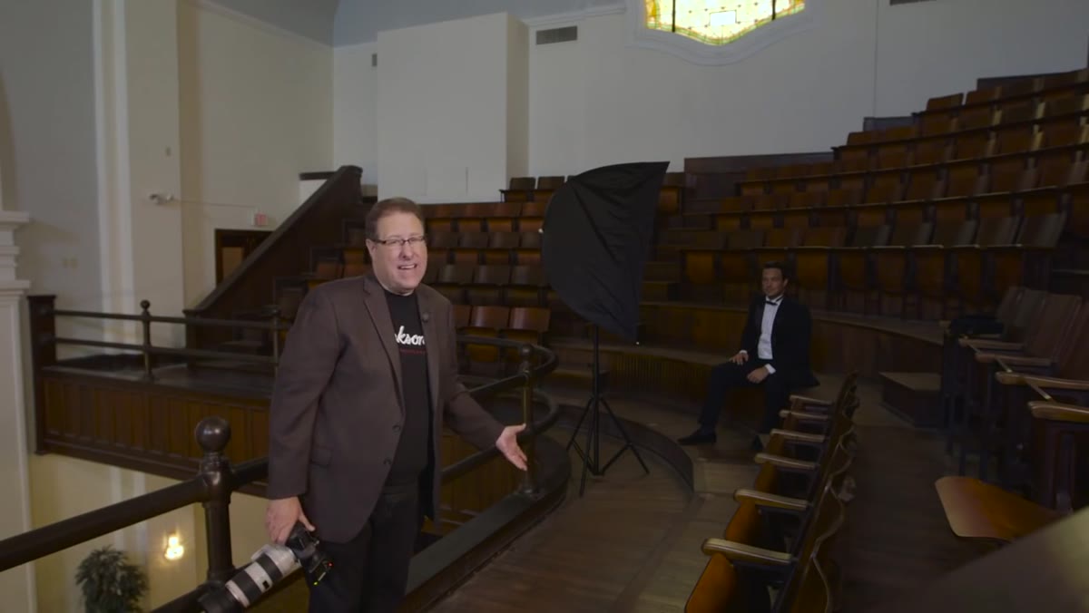 Softbox positioned at 45-degree angle to seated subject