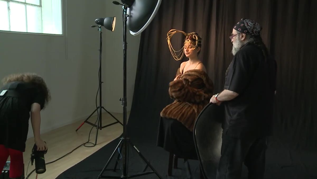 Photographer turning off strobes to shoot with available light