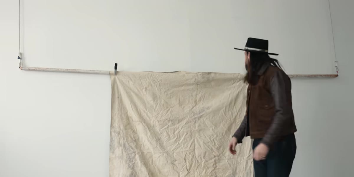 Lane points to worn, textured backdrop that looks rough in real life