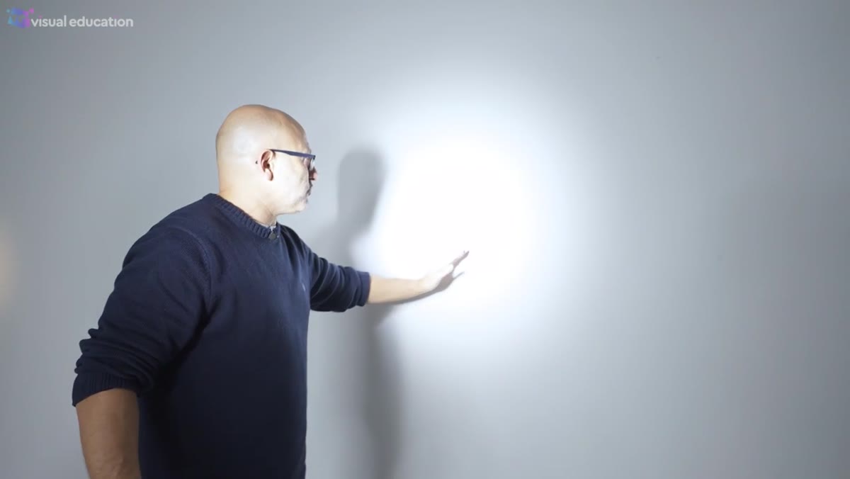 Perfect circular light circle projected on studio wall