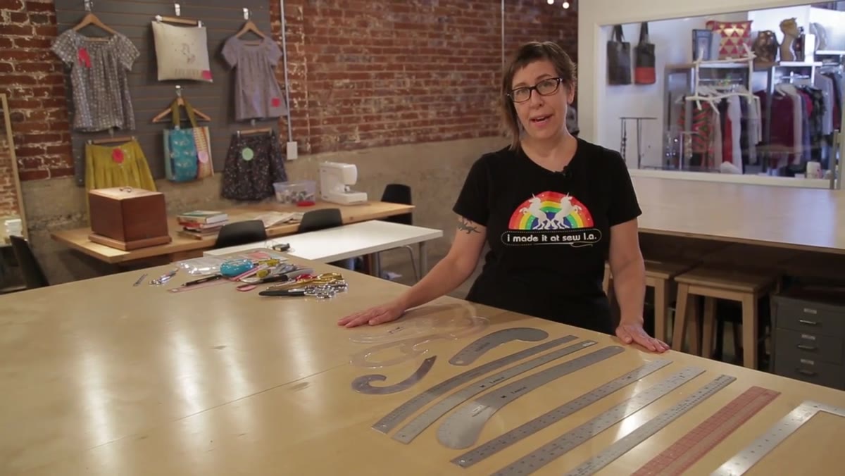 Collection of rulers, French curves, and straight edges displayed in the studio