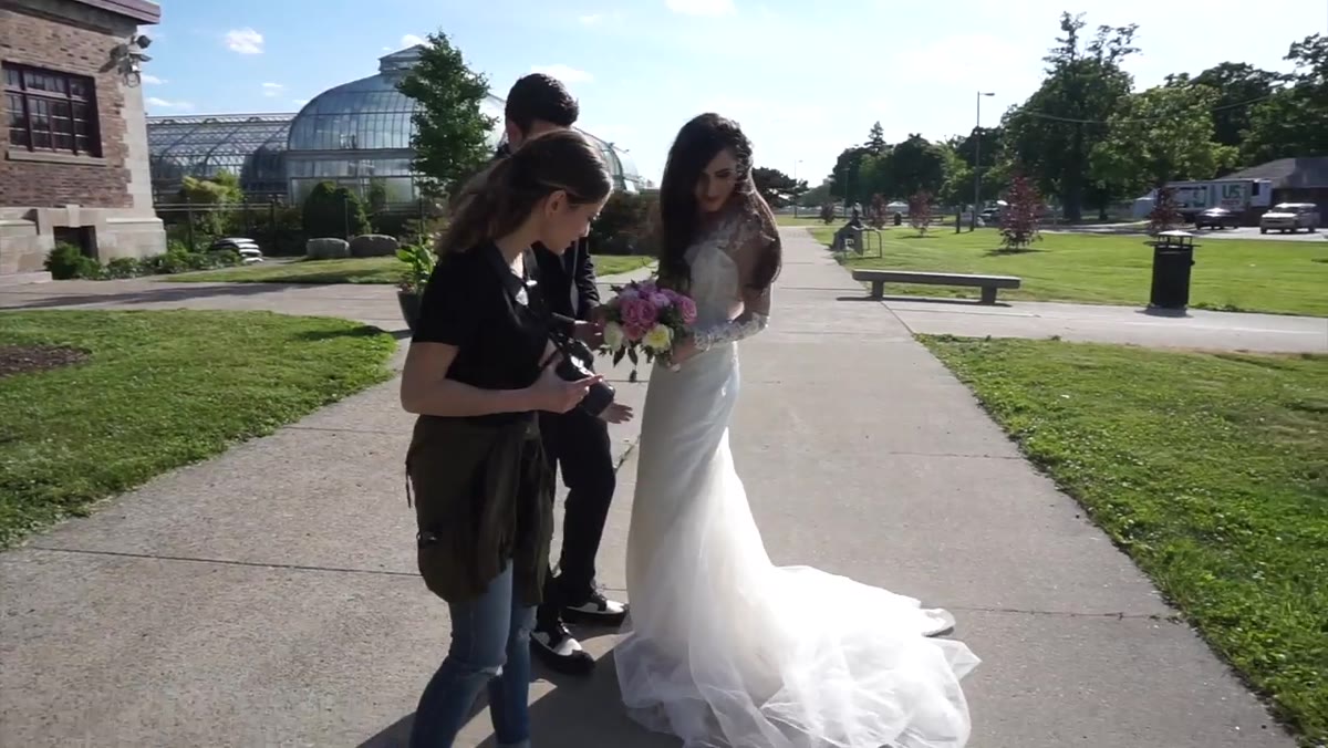 Jessica scanning the scene, positioning couple relative to sun