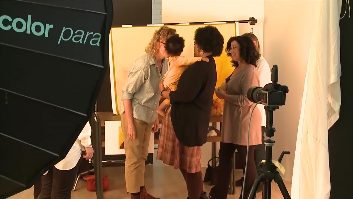 Wide shot of studio crew working around the set