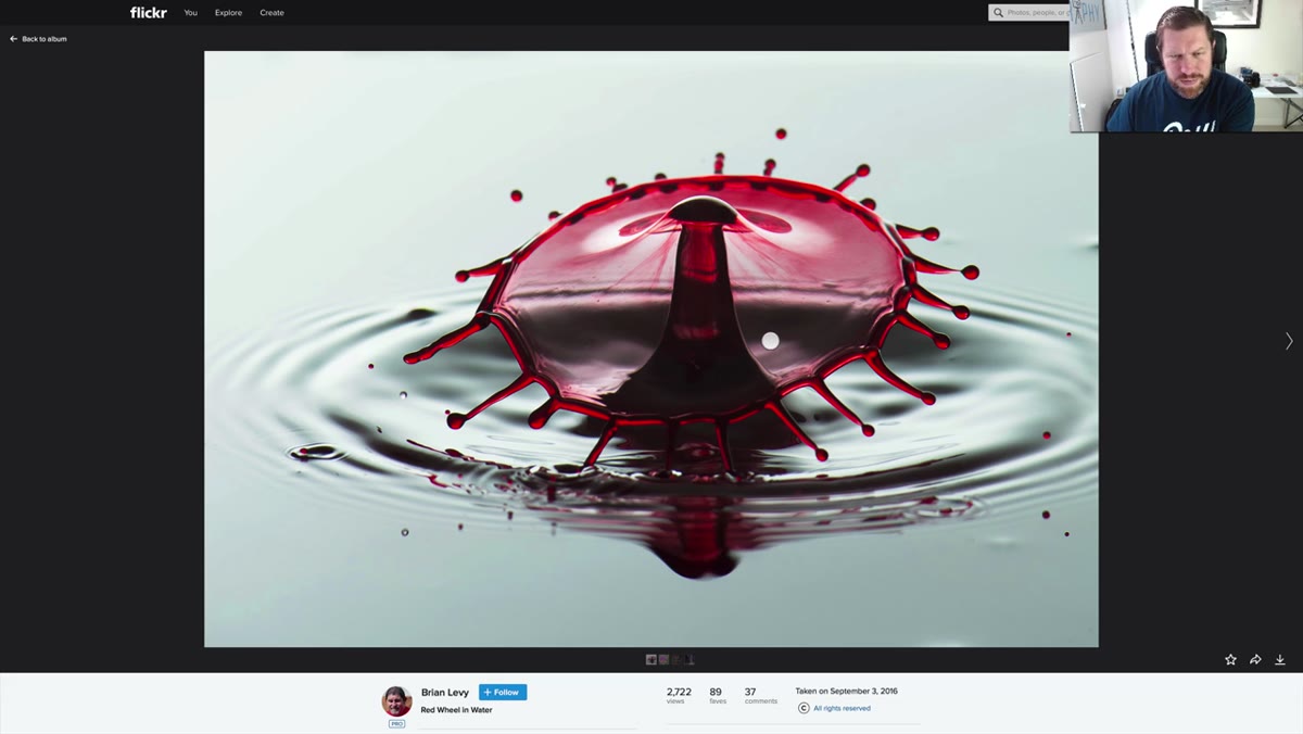 Water drop centered in frame, column not fully visible at top