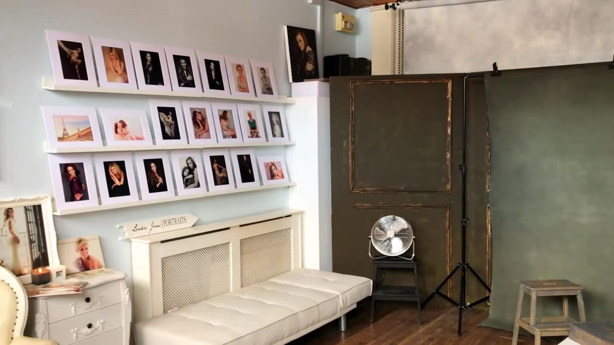Lenka mentions her reveal wall displaying finished client portraits