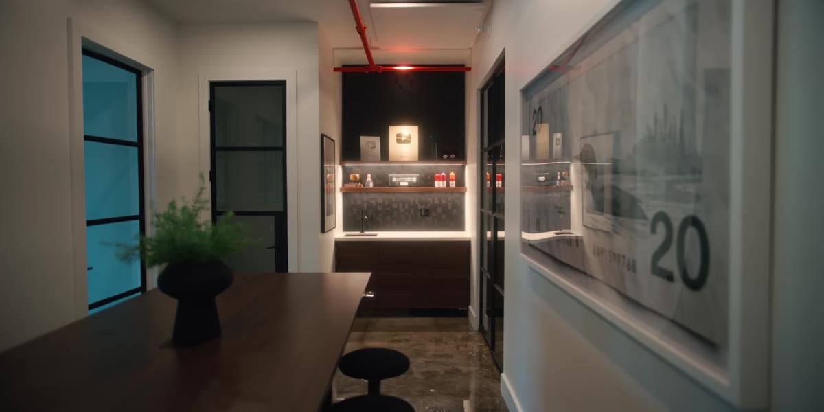 Wide shot of the boardroom with the large standing height table