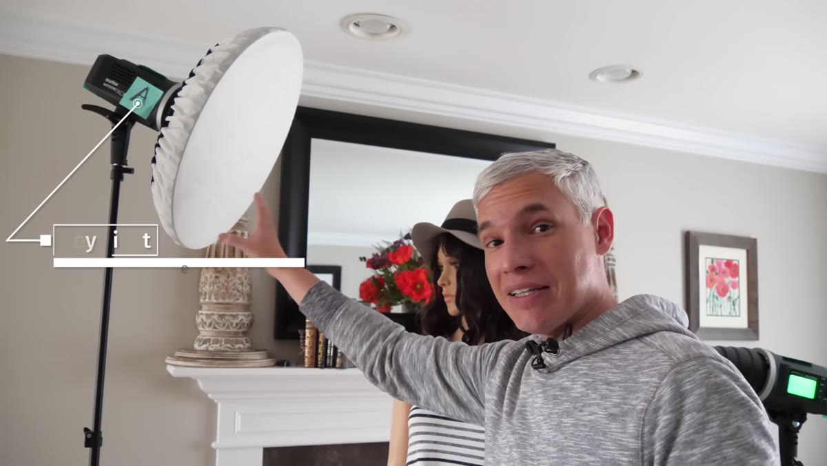 Key light on stand with beauty dish and diffusion sock attached