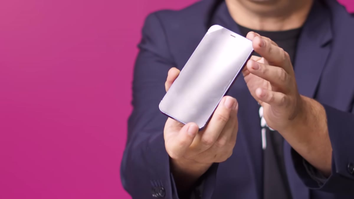 Curved glossy product demonstrating reflection from large video light source