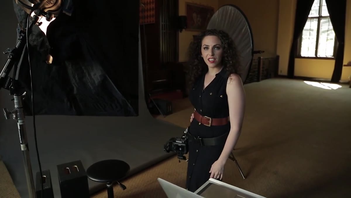 Subject shifting hips away from camera to reduce apparent width