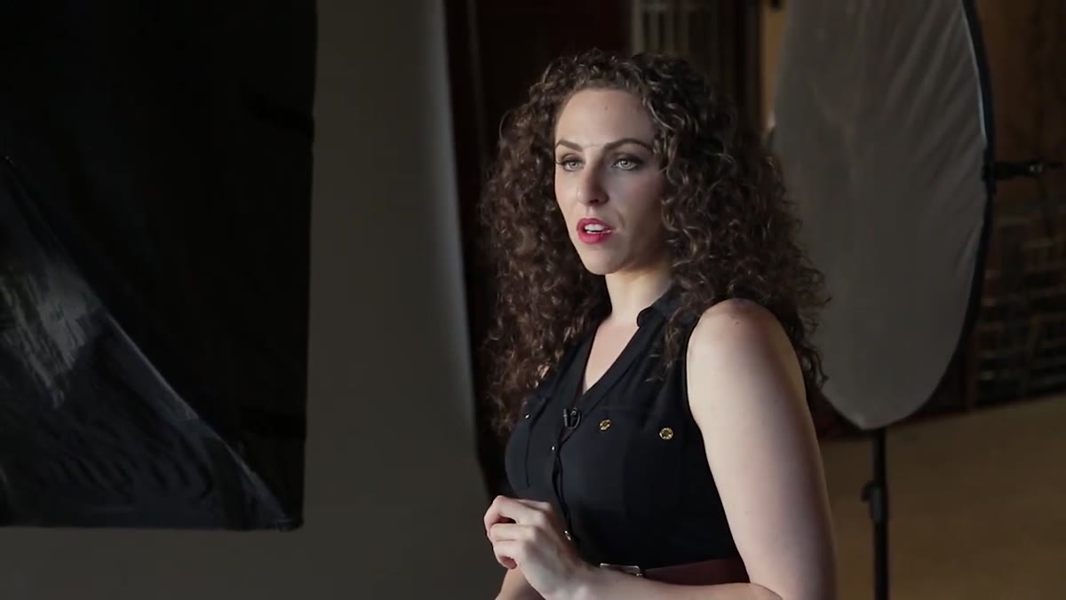 Demonstrating how shooting from a higher angle brings eyes closer to camera