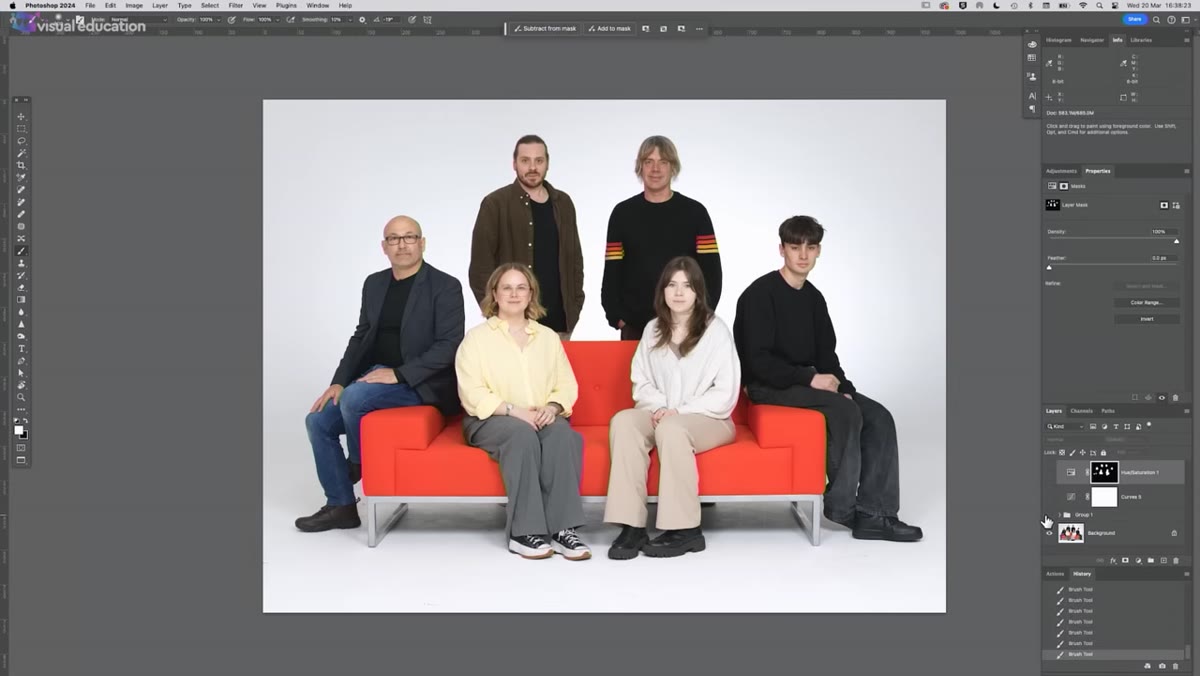 Wide softbox or large modifier illuminating the full group