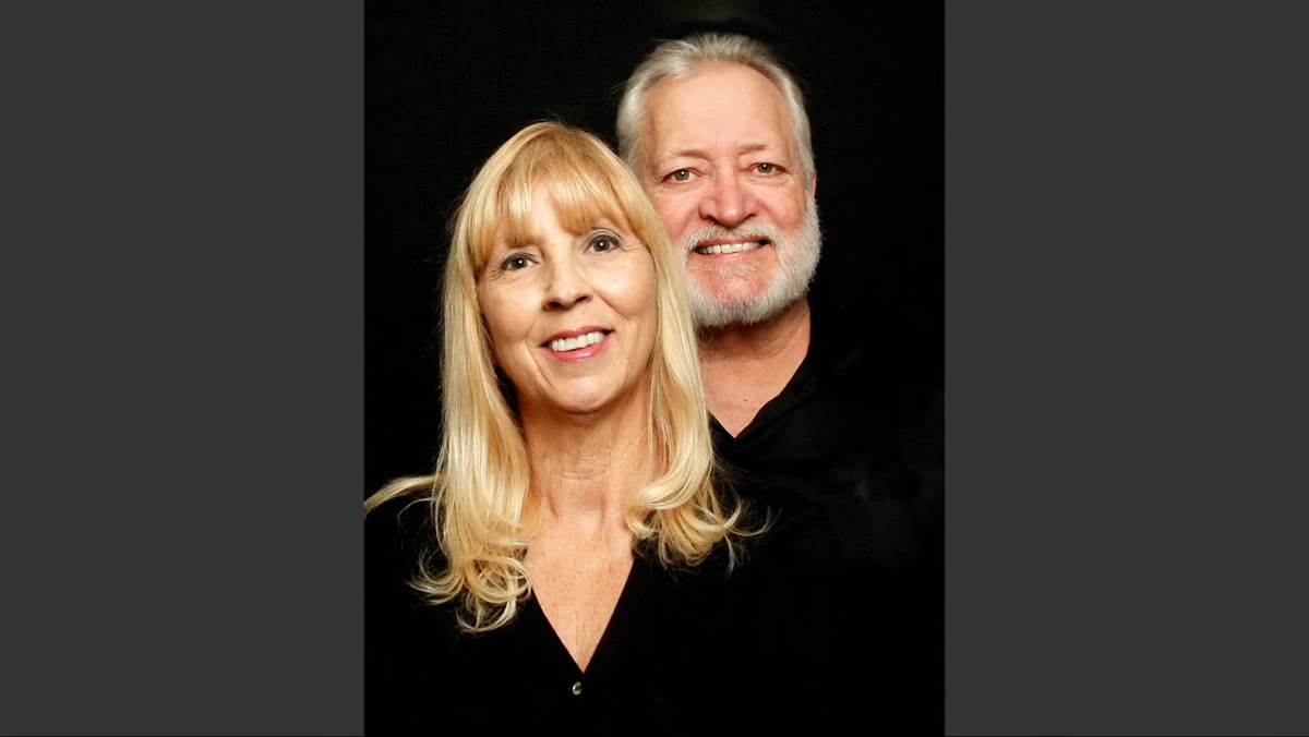 Low camera angle creating unflattering distortion on couple